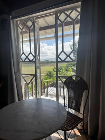 Chez Henri Hotel Pointe d'Esny Buitenkant foto